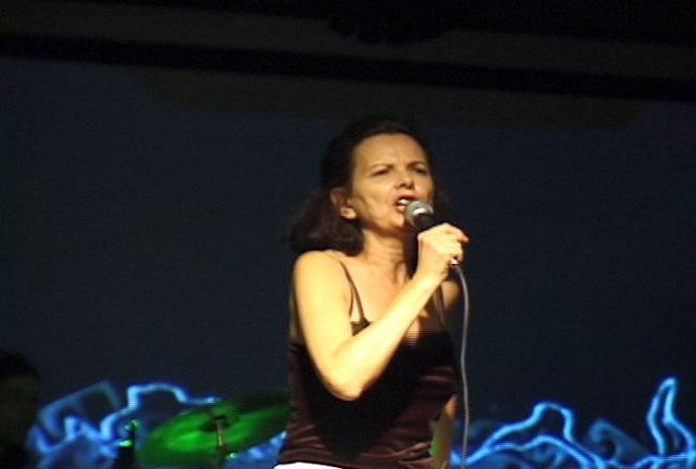 Dr. Nancy Mroczek singing.