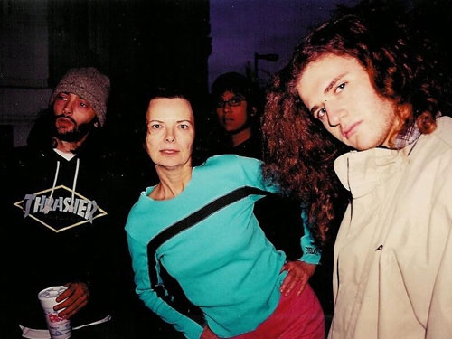 Dr. Nancy Mroczek with three men.