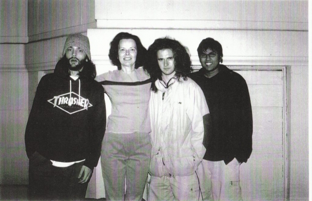 Dr. Nancy Mroczek with three men.